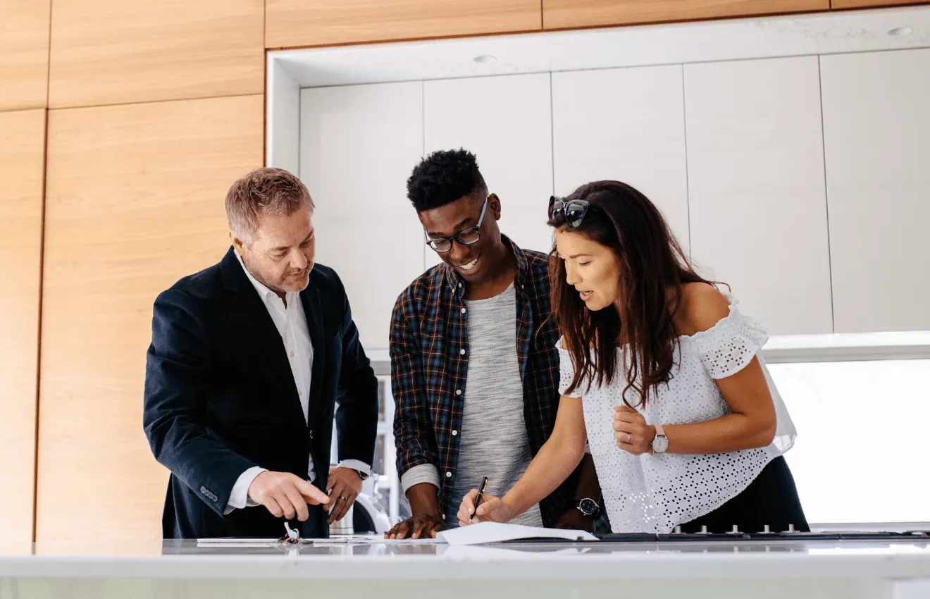 Couple Signing Contract Document_ Mortgage Options for First-Time Homebuyers