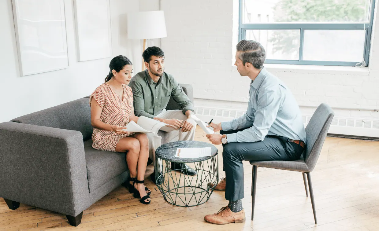 realtor advising home buyers for home inspection