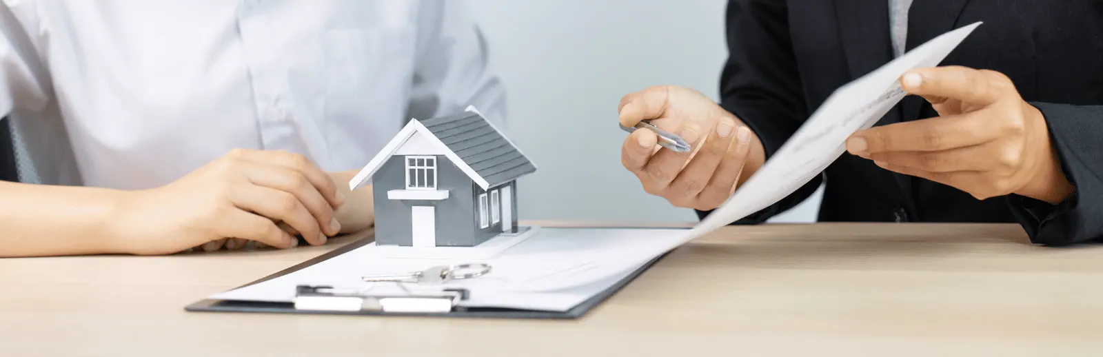 real estate investing with a broker explaining the contract