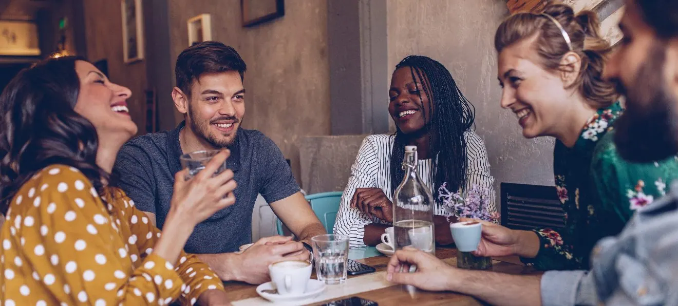Group of friends at coffee shop: Finding the Best Agent in Virginia Beach
