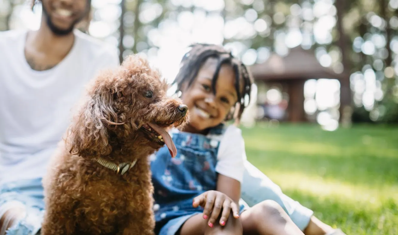 Girl with her dog: Buying a Home in Virginia Beach
